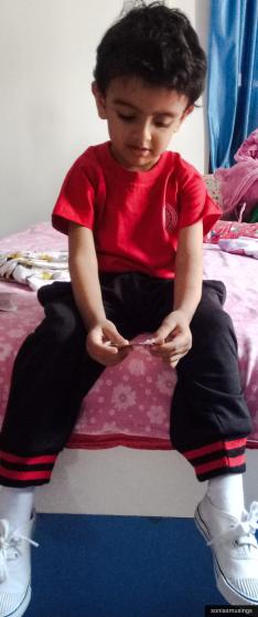 The generally muted expression reserved for school, even on the day he has games