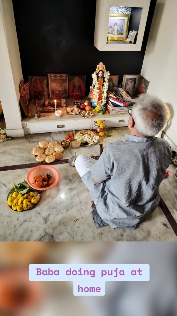Baba doing puja at home